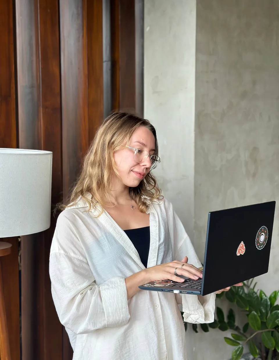 Tanya smiling at her laptop